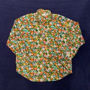 Very colorful lightweight button up with bright floral pattern.